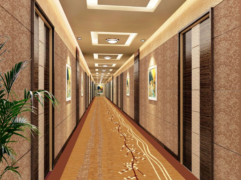 N&ecirc;n chọn hoa văn thảm h&agrave;nh lang kh&aacute;ch sạn tuỳ theo k&iacute;ch thước của h&agrave;nh lang để tạo chiều s&acirc;u v&agrave; che bụi hiệu quả
