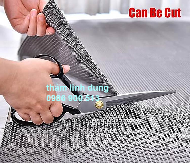 Thảm nhựa trải nhà vệ sinh dùng kéo cắt