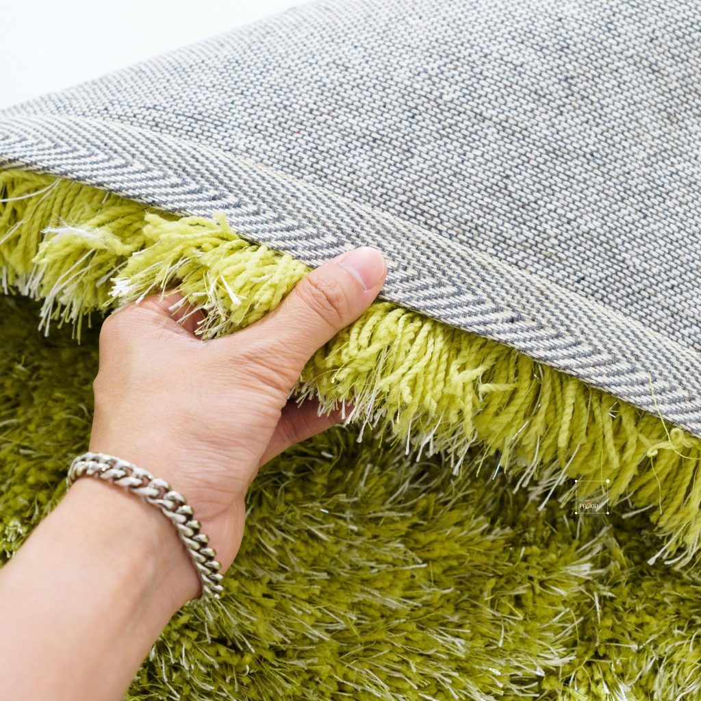 Thảm trải s&agrave;n ph&ograve;ng kh&aacute;ch mẫu mới 2026 l&ocirc;ng dệt sợi phối m&agrave;u đế Canvas