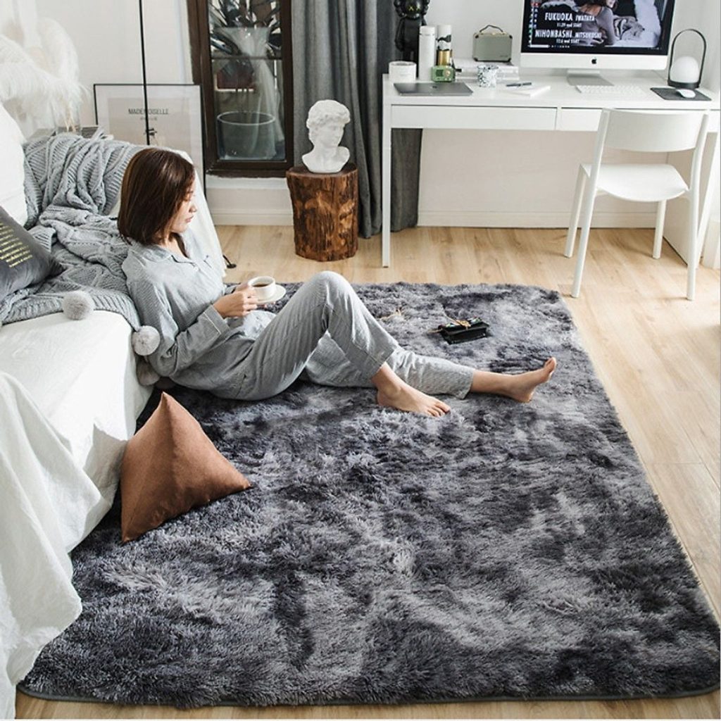 Thảm trải s&agrave;n ph&ograve;ng kh&aacute;ch mẫu mới 2026 l&ocirc;ng giả cừu si&ecirc;u mịn chống trầy
